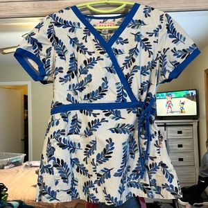 Koi by Kathy Peterson size small scrub top with tie. Blue details.